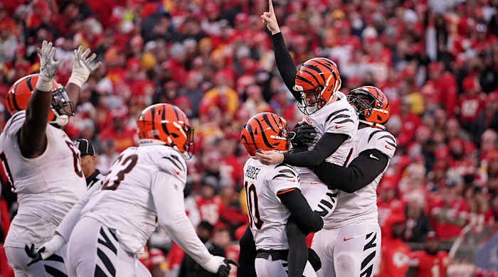 Cincinnati Bengals kicker Evan McPherson (center) celebrates his game-winning field goal against the Kansas City Chiefs in overtime.